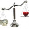 heart and cash on scales